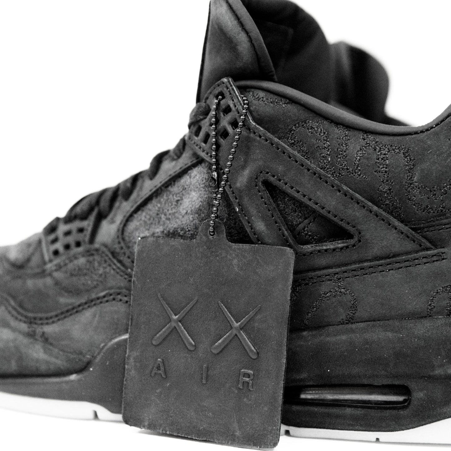 Kaws x Jordan Retro 4 Black - supergl0rious